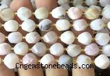 CTW708 15 inches 10mm faceted & twisted S-shaped pink opal beads